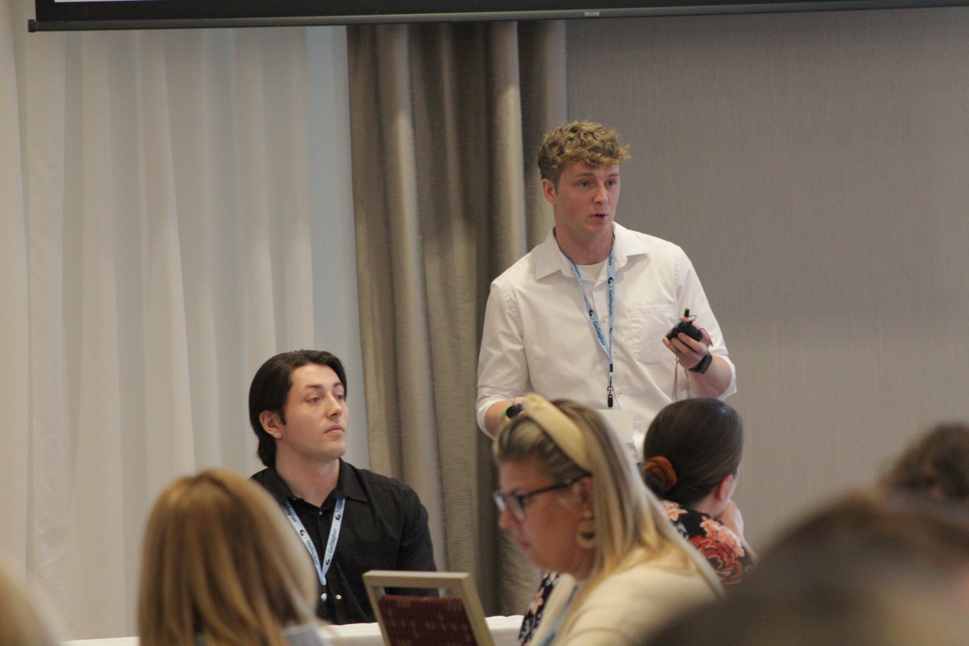 Hank speaking at a conference